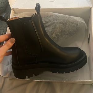 Never worn combat boots.